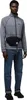 A man wearing a grey jacket and blue jeans, with a black fanny pack around his waist. Anteprima dell’immagine prodotto
