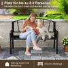 A woman and a child sitting on a black metal garden bench outdoors. Voir les images du produit