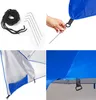 Collage of images showing parts of a beach umbrella/tent, including accessories like rope and stakes, and close-ups of the fabric and attachment points. Anteprima dell’immagine prodotto
