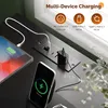 A close-up view of a charging station integrated into a dark surface, showing multiple devices being charged. Náhled obrázku produktu