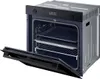 An open built-in oven with baking trays inside, shown from a slightly elevated diagonal angle. Produktbild-Vorschau