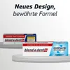 Product packaging for dental adhesive cream displayed on pedestals with marketing text. Produktbild-Vorschau
