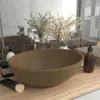 A bathroom countertop with a sink, faucet, and decorative items. Náhled obrázku produktu