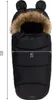 A black baby stroller footmuff with a fur-lined hood and bear ears, shown against a white background with measurement indicators. Náhled obrázku produktu