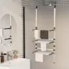 A bathroom scene with a sink and a hanging towel rack. Voir les images du produit