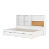 A white multifunctional bed with a bookshelf headboard and a pull-out guest bed. Produktbild-Vorschau
