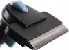 A close-up view of a pet grooming tool. Náhľad obrázku produktu