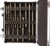 A set of drill bits and chisels in a black case. Anteprima dell’immagine prodotto