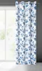 A floral patterned curtain hanging in front of a window. Anteprima dell’immagine prodotto