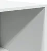 A close-up view of a white cabinet or shelf, showing the interior and a shadow cast across it. Voir les images du produit