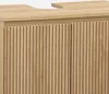 A close-up view of the front of a wooden cabinet with fluted doors. Produktbild-Vorschau