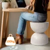 A person is sitting at a desk with a laptop, and a stool is next to them. Podgląd zdjęcia produktu