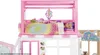 A Barbie dollhouse with a doll sleeping in a bunk bed. Produktbild-Vorschau