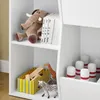 A white bookshelf filled with children's toys and books. Produktbild-Vorschau