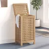 A wooden laundry basket with an open lid, placed in a room with a plant and a rug. Náhľad obrázku produktu