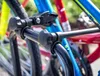 A close-up view of a bicycle rack holding multiple bicycles. Podgląd zdjęcia produktu