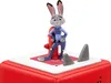A figurine of Judy Hopps from Zootopia standing on a red base with two shark fins. Produktbild-Vorschau