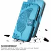 A blue phone case with a butterfly design is shown on a white background with cracked effect elements. Produktbild-Vorschau