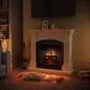A cozy living room scene with a fireplace, bookshelf, and sofa. Produktbild-Vorschau