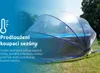 A transparent dome-shaped pool cover is set up over a round swimming pool in a grassy outdoor area. Produktbild-Vorschau