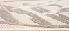 A close-up, angled view of a rug with a textured pattern. Náhled obrázku produktu