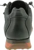 The back view of a green sneaker with an orange sole. Voir les images du produit