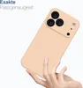 A hand holding a peach-colored phone case with a camera cutout. Produktbild-Vorschau