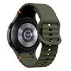 The back of a dark green smartwatch with a ribbed silicone band is shown against a white background. The watch has orange accents on the band attachment points. Náhled obrázku produktu