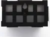 The back of a black plastic organizer box with multiple compartments. Anteprima dell’immagine prodotto