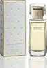 A perfume bottle and its box are displayed on a white background. Voir les images du produit
