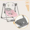 A pink baby swing with toys hanging from the top, shown from a side angle. A close-up inset shows the control panel. Produktbild-Vorschau