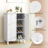 A white shoe cabinet with its door open, displaying shoes on shelves. Several close-up images highlight product features. Produktbild-Vorschau