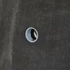 A close-up view of a roof drain fitting on a dark, textured surface. Produktbild-Vorschau