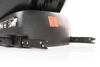 Close-up view of the base of a black car seat, showing the ISOFIX connectors. Produktbild-Vorschau