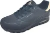 A black Skechers sneaker with gold accents is shown from the side against a white background. Voir les images du produit