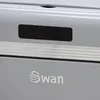 A close-up of a gray metallic product with the brand name 'Swan' visible. Podgląd zdjęcia produktu