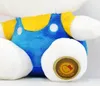A close-up view of a plush toy, showing its clothing and a detail on its foot. Anteprima dell’immagine prodotto