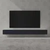 A modern, minimalist living room setup featuring a wall-mounted TV and a lowboard media console against a concrete wall. Produktbild-Vorschau