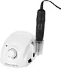 A white electric nail grinder with a black handpiece resting in a holder. Produktbild-Vorschau