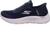 A side view of a navy blue Skechers Go Walk sneaker with a white sole. Anteprima dell’immagine prodotto