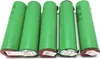 Five green cylindrical batteries are arranged diagonally on a white background. Produktbild-Vorschau