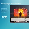 A man stands in front of a large explosion on a TV screen, with sound waves emanating from the screen. Produktbild-Vorschau