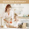 A mother and daughter are in a kitchen, preparing food. Produktbild-Vorschau