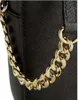 A close-up shot of a black handbag with a gold chain detail. Podgląd zdjęcia produktu