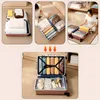 Collage showing how to pack clothes into vacuum bags and then into a suitcase. Voir les images du produit