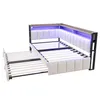A bed frame with a pull-out trundle bed, shown against a white background. Voir les images du produit