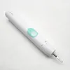 A white electric toothbrush with a mint green button is lying on a white surface. Produktbild-Vorschau
