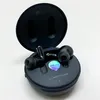 A pair of black LG TONE Free DFP9 in-ear headphones are shown in their open charging case. Produktbild-Vorschau