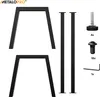 A collection of black metal table legs and hardware, laid out against a white background. Voir les images du produit