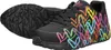 A pair of black sneakers with a colorful heart pattern on the side, shown from a diagonal angle. Voir les images du produit